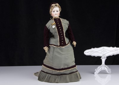 Lot 202 - A large Portrait Jumeau pressed bisque swivel head fashionable doll