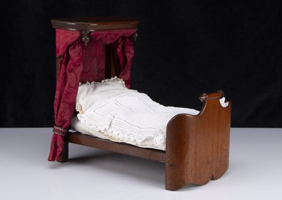 Lot 203 - A 19th century mahogany half tester bed