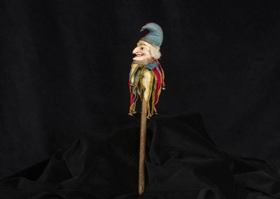Lot 218 - A late 19th century composition Mr Punch or Pulcinella head marotte