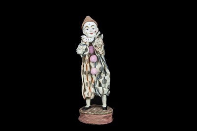 Lot 219 - A German 1920s composition headed clown squeak toy