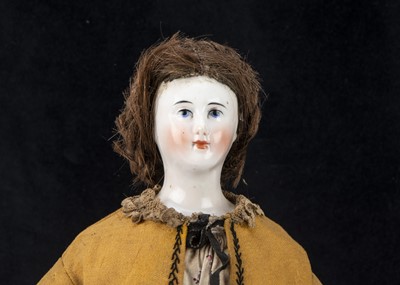 Lot 250 - An early German pink tinted china wigged shoulder-head doll