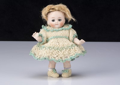 Lot 256 - A small Kestner all-bisque 111 googly eyed doll