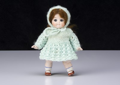 Lot 258 - A small Kestner all-bisque 111 googly eyed doll