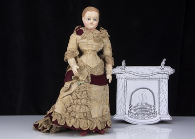 Lot 268 - A 19th century English wax over papier-mache shoulder-head doll