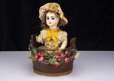 Lot 273 - A late 19th century French automaton of a girl in bath tub