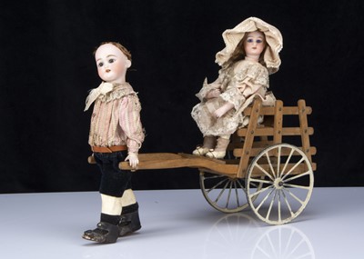 Lot 277 - A Roullet & Decamps automaton hand cart with bisque headed boy and girl