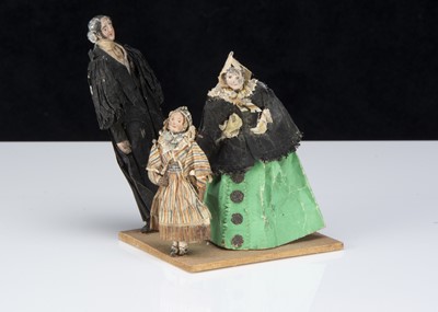 Lot 282 - An unusual 19th century paper model of preacher, woman and girl