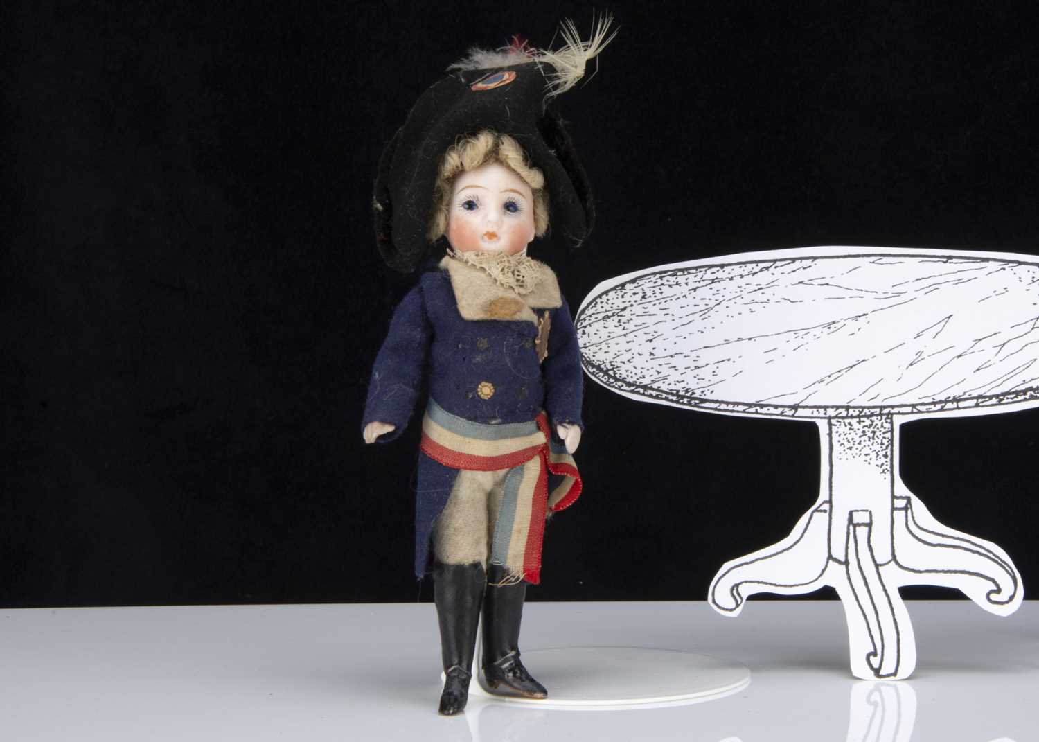 Lot 296 - An all-bisque dolls' house doll in French revolutionary uniform