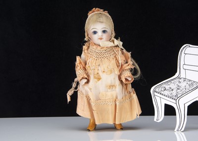 Lot 307 - A larger scale Kestner 184 all-bisque dolls’ house doll