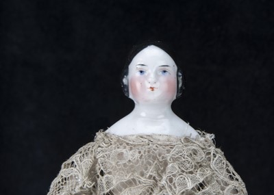 Lot 313 - A Conta and Boehme pink-tinted china shoulder head dolls’ house doll