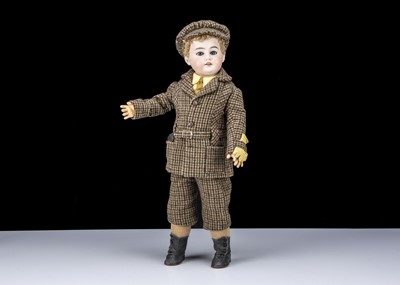 Lot 320 - An Armand Marseille 1892 boy doll in dapper outfit