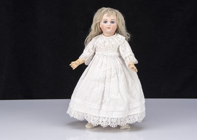 Lot 321 - A German bisque headed closed mouth doll