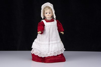 Lot 322 - A German bisque headed closed mouth doll with walking mechanism