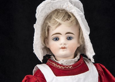 Lot 322 - A German bisque headed closed mouth doll with walking mechanism