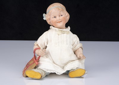 Lot 334 - A Gebruder Heubach 7788 Coquette character girl baby