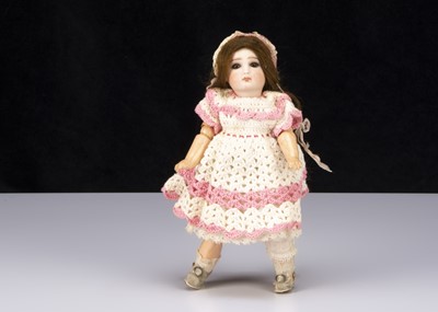 Lot 343 - A small German bisque headed closed mouth doll