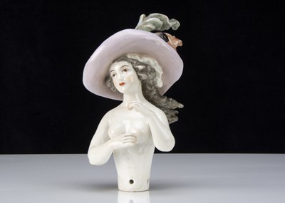 Lot 350 - A fine half-doll in elaborate hat