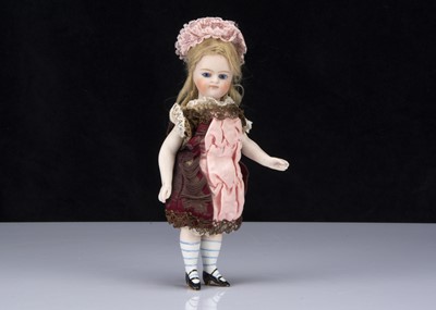 Lot 377 - A larger all-bisque Gebruder Kuhnlenz Mignonette type doll