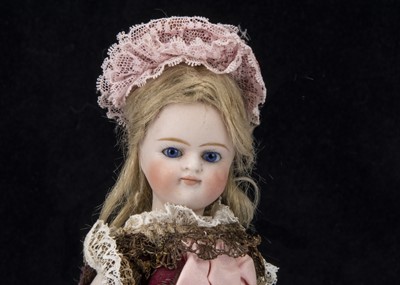 Lot 377 - A larger all-bisque Gebruder Kuhnlenz Mignonette type doll