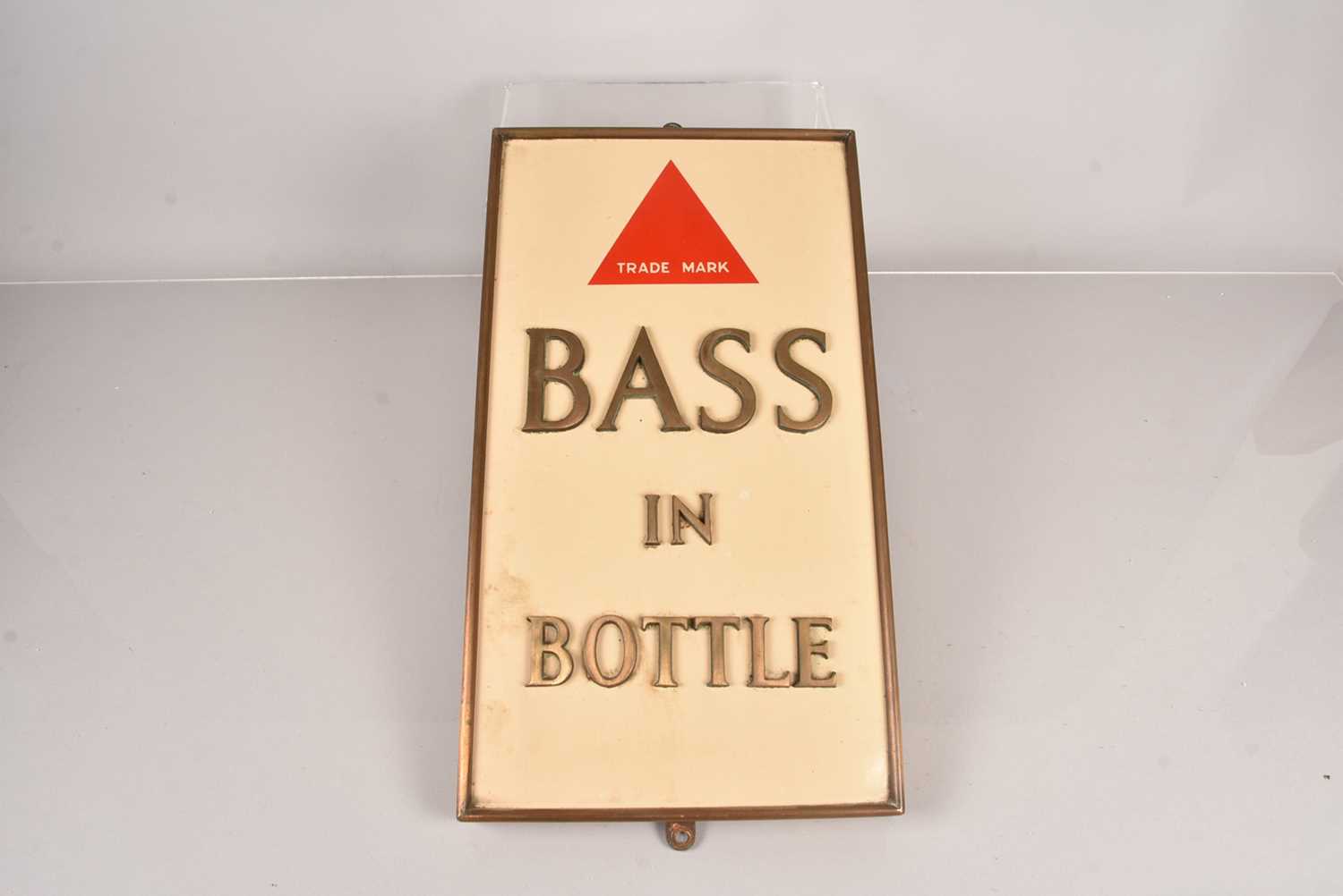Lot 131 - A vintage 'Bass in Bottle' advertising sign