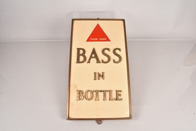 Lot 131 - A vintage 'Bass in Bottle' advertising sign