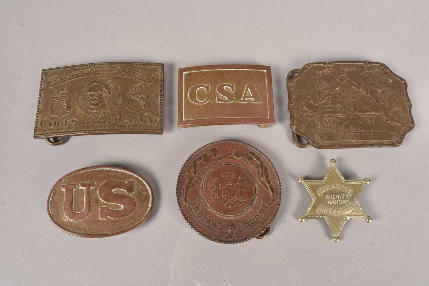 Lot 142 - An assortment of belt buckles