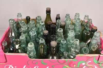 Lot 157 - A good collection of glass advertising bottles