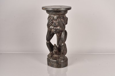 Lot 269 - An African carved wooden figural stand