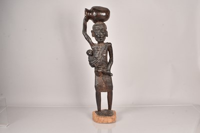 Lot 273 - A large carved wooden figure of a female