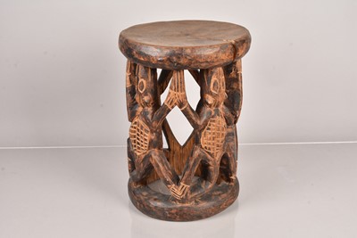 Lot 276 - An African Stool