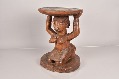 Lot 278 - A carved African Fertility stool