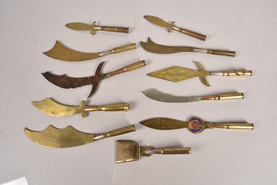 Lot 524 - A collection of trench art letter openers/page turners