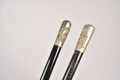 Lot 542 - Two white metal topped swagger sticks