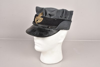 Lot 576 - A British WRAF/WAAF Warrant Officer's peak cap