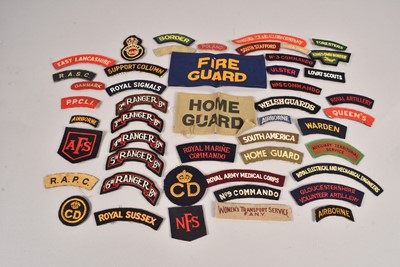 Lot 620 - An assortment of Cloth Shoulder Titles