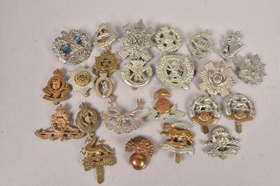 Lot 640 - A collection of Military Cap badges