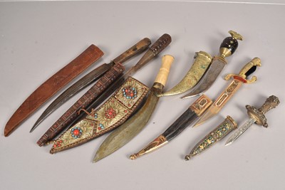 Lot 717 - A small collection of Overseas knives