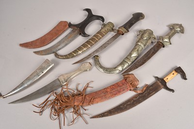 Lot 718 - A selection of Middle Eastern daggers