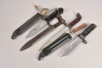 Lot 763 - Three AK47 bayonets and scabbards