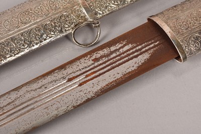 Lot 792 - A late 19th Century/ early 20th Century Omani Kattara sword