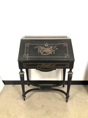 Lot 52 - An early 20th century French ebonised and brass inlaid writing table