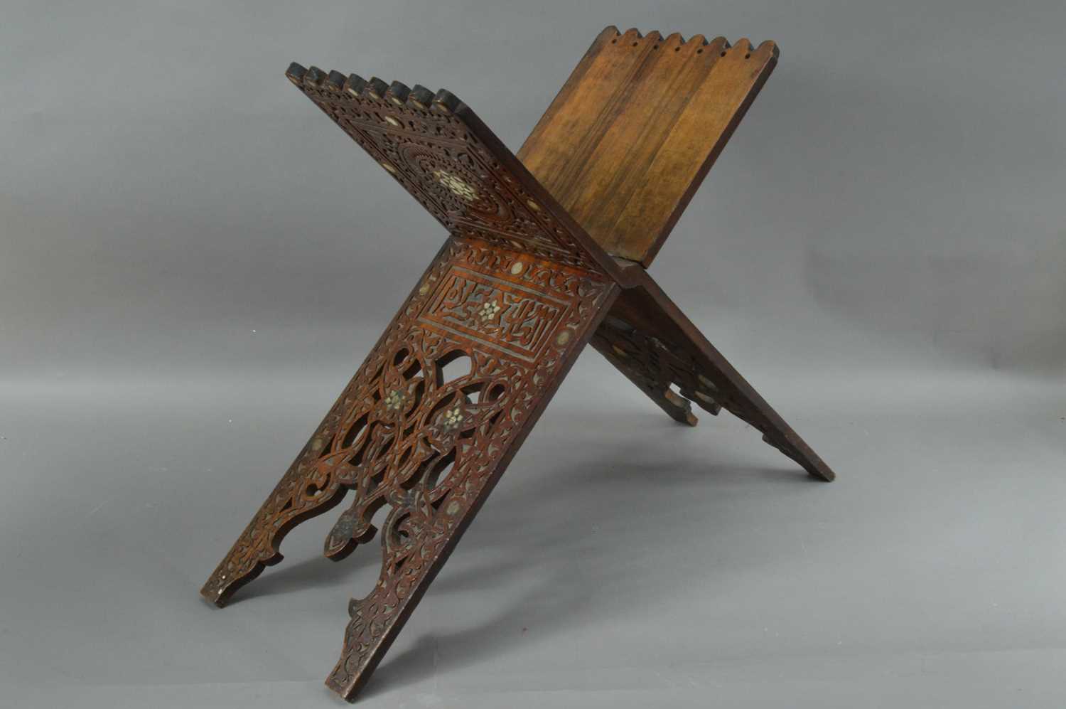 Lot 90 - A carved hardwood Quran stand