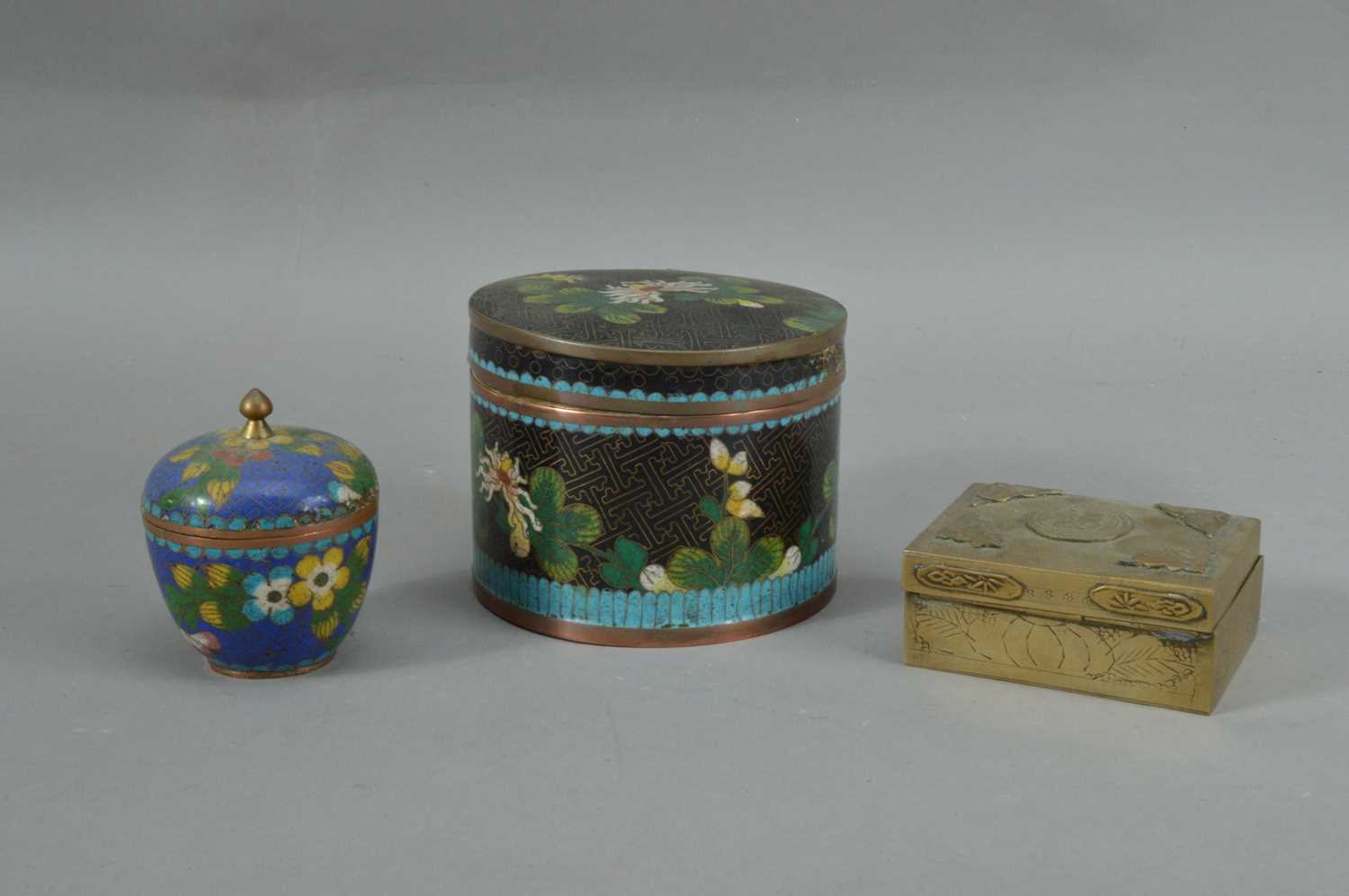 Lot 91 - A far eastern metal and enamel cloisonne circular jar and cover