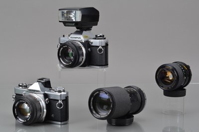 Lot 319 - Two Olympus OM SLR Cameras