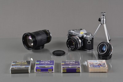 Lot 474 - An Olympus OM-30 SLR Camera