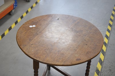 Lot 6 - A 19th century provincial oak cricket table
