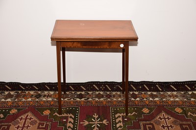 Lot 7 - An Edwardian walnut and crossbanded card table