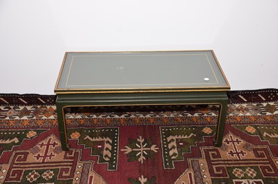 Lot 11 - A modern green and gilt painted coffee table