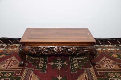 Lot 18 - An early 20th century Chinese hardwood coffee table
