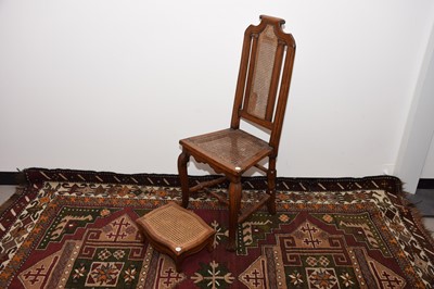 Lot 40 - A late 19th century continental walnut and rattan chair and footstool